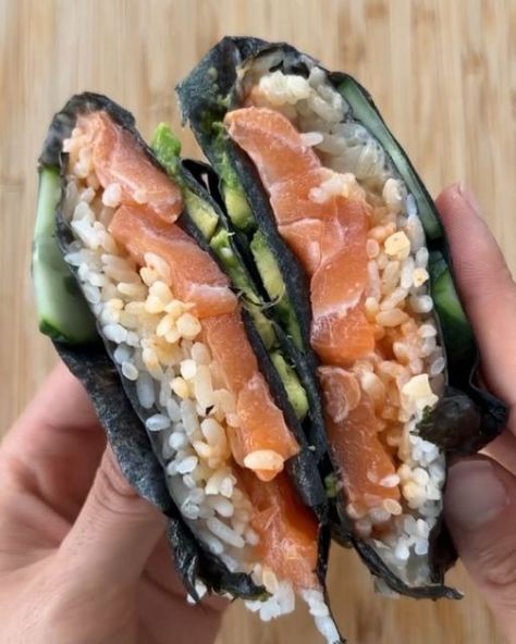 Healthy Eating on Instagram: "Sushi Wrap by @londonbruncher

This sushi wrap is perfect when you want a quick but healthy lunch! It’s best eaten straight away as the seaweed will go soggy if left for too long. You can switch up the fillings and use up any leftovers you have!

INGREDIENTS:

Nori (seaweed for sushi) 
Rice paper (soaked in water until just softened)
Sushi rice (cooked)
Salmon sashimi
Kewpie mayo
Sriracha 
Cucumber (sliced)
Avocado (diced)
Sesame seeds" Sushi Wrap, Kewpie Mayo, Cooked Salmon, Sliced Avocado, Salmon Sashimi, Nori Seaweed, Cooking Salmon, Sushi Rice, Asian Inspired