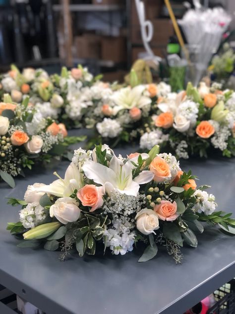 Peach roses and coffe bean look lovely in these centerpieces with stock and white lilies ❤️ Wedding Centerpieces Lilies, Condolence Flowers, Floral Art Arrangements, Wedding Consultant, Creative Flower Arrangements, Table Arrangement, Flower Arrangements Diy, Peach Roses, White Lilies