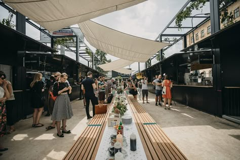 Manifesto Market transforms Prague's heartland with black containers as a new food space Market Place Architecture, Food Market Architecture, Street Market Design, Food Market Design, Modern Supermarket, Market Canopy, Market Architecture, Community Market, Architecture Community