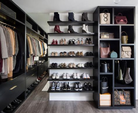 Black oak floating shoe shelves in a walk-in closet beside a floor to ceiling mirror and black cabinets with brass pulls. Room Shoe Rack, Dream Closet Room, Contemporary Closet, Black Closet, Ikea Bookcase, Built In Dresser, White Closet, Shoes Rack, Black Shelves