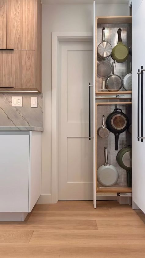 Perfect tall pull-out for our pots and pans! @revashelf to the rescue. This pull-out is right next to our dishwasher so hanging the pots… | Instagram Dishwasher Cabinet, Pull Out Kitchen Cabinet, Tall Kitchen Cabinets, Building Kitchen Cabinets, Kitchen Pans, Pot Storage, Kitchen Cupboard Designs, Hanging Cabinet, Villa Park