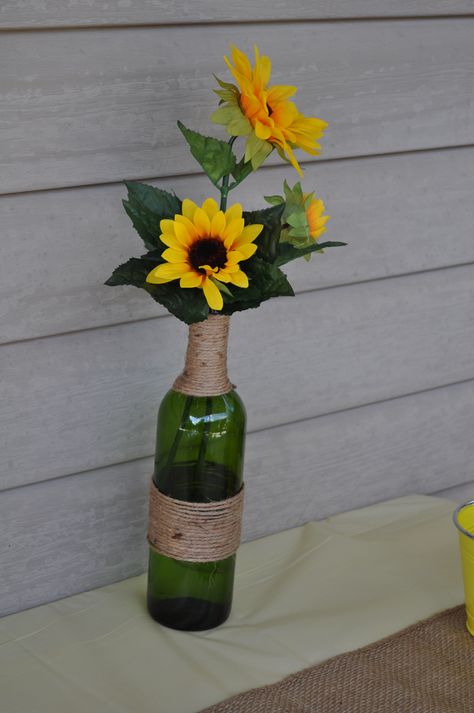 Wine bottle with twine Wine Bottle Flower Arrangements Wedding, Sunflowers In Wine Bottles, Wine Bottle Flower Vase, Wine Bottle Bottle Flower Vase, Sunflower Wedding Centerpieces, Sunflower Centerpieces Wedding Budget-bride.shop, Anniversary Centerpieces, Cowboy Themed Birthday Party, Wine Bottle Crafts Christmas