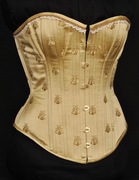 This is a victorian corset made of Chinese silk brocade with embroidered honey bees. It consists of two layers of white coutil, gold grommets in the back and a gold busk. Made for a friend who happ... Bee Corset, Bee Clothes, Butterfly Corset, Bee Clothing, Corset Victorian, Bee Fashion, Honey Dress, Gold Corset, Wedding Corset