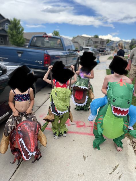 Jurassic park theme birthday game using inflatable costumes for kiddos to run a raptor/dinosuar race Park Birthday Games, Halloween Costumes Boys, Kids Dinosaur Costume, Inflatable Dinosaur Costume, Inflatable Dinosaur, Jurassic Park Birthday, Kids Halloween Costumes, Inflatable Costumes, Up Costume