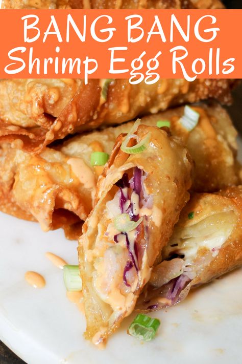 Bang Bang Shrimp Egg Rolls are filled with delicious shrimp, slaw, and the super popular Bang Bang sauce! Perfect game day snack or appetizer! The Best Egg Rolls, Fun Eggroll Recipes, What Goes With Egg Rolls, Egg Roll Dinner Ideas, Baked Eggroll Recipes, Shrimp Egg Roll Filling Recipes, Easy Shrimp Egg Roll Recipes, Easy Egg Roll Recipes Simple, Shrimp Spring Rolls Fried