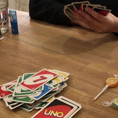 A fun game of Uno at a party with friends You Are My Moon, Uno Cards, Night Travel, Classic Card Games, Cute Date Ideas, Camping Party, Classic Card, House Rules, Family Night