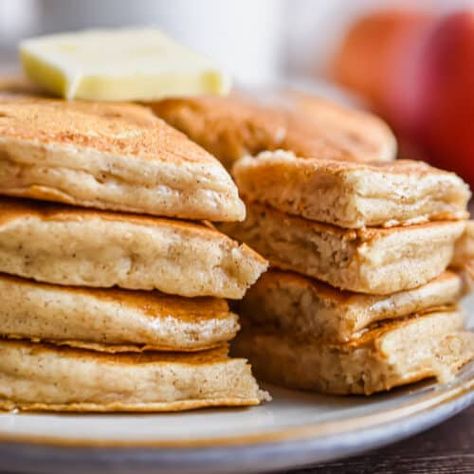 A piece of the applesauce pancakes is cut out of the stack. Potato Pancakes With Applesauce, Apple Cinnamon Topping For Pancakes, Applesauce Pancakes No Eggs, Applesauce Pancakes For Baby, Vegan Pancakes Applesauce, Pancakes With Cinnamon, Easy Applesauce, Applesauce Pancakes, Cinnamon Applesauce