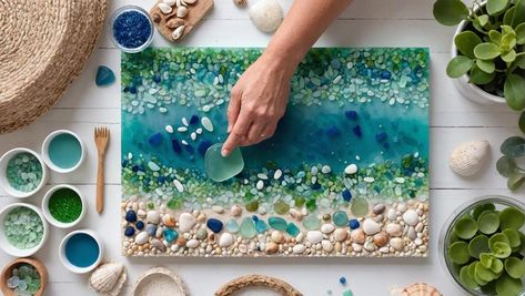 Bring the ocean into your home with sea glass resin art. Learn how to create stunning beach-themed artwork using epoxy resin and faux sea glass. Epoxy Resin Pictures Ideas, Glass Pebble Beach, Sea Glass Resin, Glass Resin Art, Beach Projects, Diy Resin Crystals, Sea Glass Artwork, Fluid Art Painting, Resin Crafts Tutorial