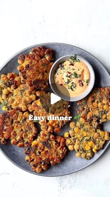 Easy Plant Based Recipes on Instagram: "You need to try these ✨Chickpeas Sweetcorn Fritters✨😋

By @Nadiashealthykitchen

They’re perfect as a light lunch or side dish. I also love hearing up leftovers in the morning to enjoy as a savoury breakfast 😍

As well as being delicious, they’re also a great source of protein and fibre! 🙌🏼

INGREDIENTS

80g chickpea (gram) flour
1/2 tsp salt
1/4 tsp baking powder
1 tsp curry powder
1 tsp paprika
1/2 tsp chilli powder
1/2 tsp cumin
1/4 tsp black pepper
1 tbsp lemon juice
80ml ml water
1x (400g) canned chickpeas drained and rinsed
80g frozen sweetcorn thawed
1/4 red onion finely chopped
2 garlic cloves crushed
handful of fresh coriander chopped

INSTRUCTIONS

In a bowl, mix together the flour, salt, baking powder and spices.
Pour in the water and Garbonzo Beans, Sweetcorn Fritters, Savoury Breakfast, Ic Recipes, Healthy Beans, Plant Based Recipes Easy, Source Of Protein, Plant Based Cookbook, Gram Flour