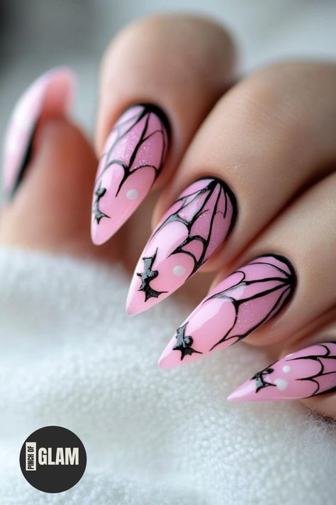 Looking to add a touch of sweetness to your Halloween look? Check out these stunning pink Halloween nails! Whether you prefer acrylic or gel, these pink nail designs are perfect for getting in the spooky spirit with a stylish twist. From pastel pink hues to bold neon shades, you'll find the perfect pink nail art ideas to amp up your Halloween style. Embrace the season with a pop of pink on your nails and stand out from the crowd at any haunted gathering. Pink And Blue Halloween Nails, Nails Pink Halloween, Neon Pink Halloween Nails, Pink Vampire Nails, Halloween Neon Nails, Pink Halloween Nail Designs Short, Light Pink Halloween Nails, Pastel Goth Nail Art, Pink Witchy Nails