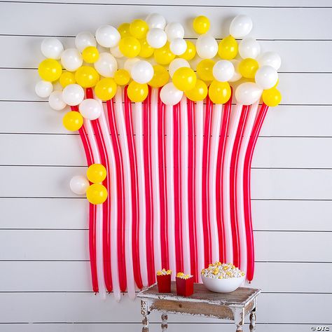 Help your movie night’s look pop! Make movie night even more exciting with this eye-catching wall decoration that looks like a huge popcorn box filled ... Popcorn Bar Movie Night, Popcorn Theme Party Decoration, Popcorn Balloon Garland, Carnival Balloon Decorations, Popcorn Party Decorations, Popcorn Balloon Arch, Popcorn Theme Party, Circus Fundraiser, Movie Night Themed Birthday Party