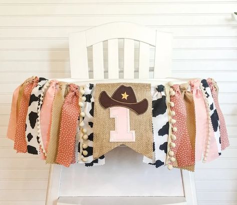 17+ First Rodeo Birthday Party Ideas You'll Love - One Sweet Nursery Backdrop Garland, Girls Farm Birthday, 1st Birthday High Chair, Cow Print Fabric, Rodeo Birthday Parties, Cow Birthday Parties, Birthday High Chair, Farm Theme Birthday, Farm Animals Birthday Party