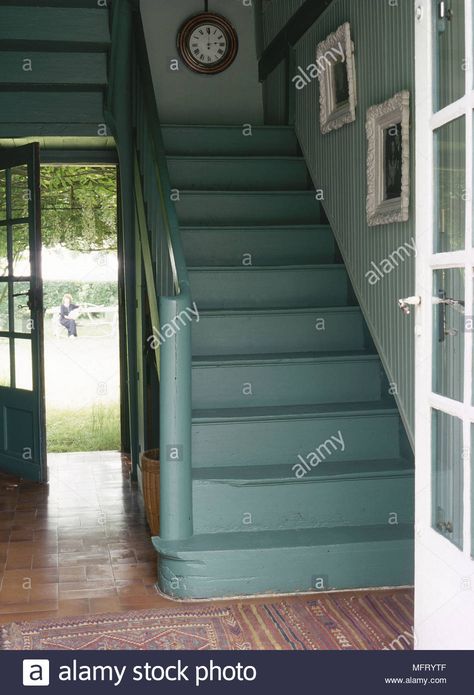 View through open door to green painted staircase in traditional style hallway Stock Photo Green Stairs, Staircase Photos, Painted Staircase, Style Hallway, Showroom Inspiration, Painted Staircases, Stair Well, Small Bedroom Storage, Traditional Staircase