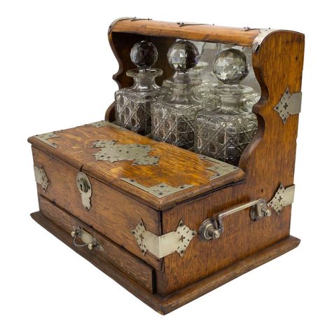 English Victorian oak tantalus case with 3 cut crystal decanters and drawer with silver plate fittings. Historical Antiques, Victorian Antiques, Test Tubes, Cocktail Set, Crystal Decanter, Antique Boxes, Gothic Home Decor, Gothic House, Test Tube