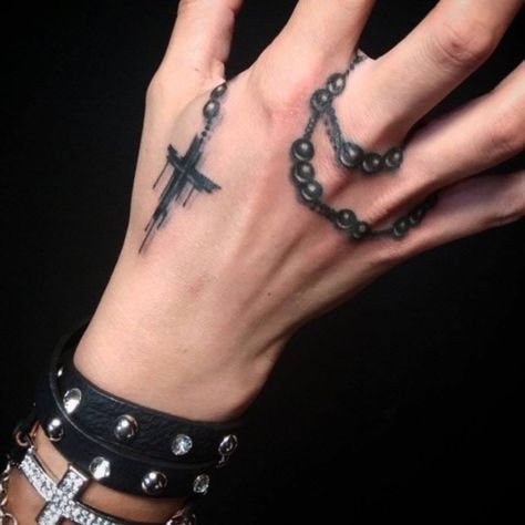 31 Rosary Beads Tattoos With Symbolism and Meanings Rosary Tattoo Wrist, Rosary Tattoo On Hand, Rosary Bead Tattoo, Cross Tattoo On Hand, Rosary Tattoo, Rose Hand Tattoo, Tattoo On Hand, Necklace Tattoo, Armband Tattoos