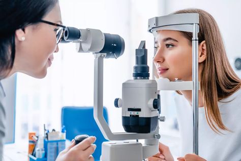 If You See A Halo Or Glare Around Lights, You Need To See Your Doctor Now | iHeart Parts Of The Eye, Primary Care Doctor, Medical Billing And Coding, Billing And Coding, Eye Exam, Eye Surgery, Eyes Problems, Eye Doctor, Female Doctor