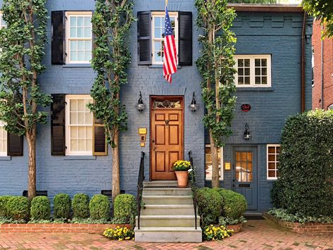 Learn some American flag facts and the best way to display your flag at home #curbappeal #Americanflag Door Colors For Blue House, Blue Brick House Exterior, Brick Exteriors, Georgetown Dc, Best Front Door Colors, Brick Homes, Best Front Doors, Painted Brick House, Orange Door