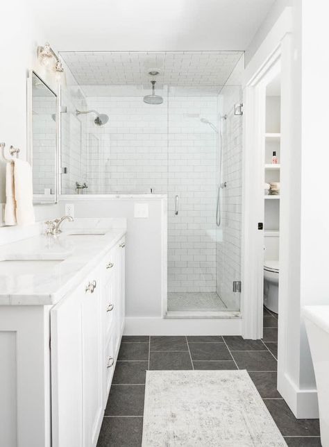 Bath With White Vanity, Half Bath Gray Tile Floor, Bathroom With Walk In Shower And Soaker Tub, High Ranch Bathroom Remodel, White Brick Shower Wall, Master Shower Modern Farmhouse, Bathroom Remodel With Dark Floors, Bathroom Dark Floors White Cabinets, Cascade Ridge Slate Tile Bathroom