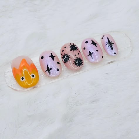 On a roll with the anime nails. Checkout my Etsy store https://blingitonnails.etsy.com #calcifer#howlsmovingcastle #anime #animeart #animenails #cosplay #nails #smallbusiness #nailsdesign #nailartist #womenowned #Etsy #popupshop #oc #gelnails #nailart #fashion #beauty #BlingItOnNails Howls Moving Castle Nail Art, Calcifer Nails, Cosplay Nails, Howls Moving Castle Nails, Castle Christmas, Nail Aesthetic, Anime Nails, Nails For Kids, Howl's Moving Castle