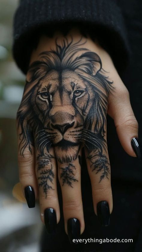 45+ Lion Tattoo Ideas to Give You Inspiration for Your Next Ink Lion Tattoo Hand Woman, Birthdays Tattoo Ideas, Back Lion Tattoo Women, Lion Wearing Crown Tattoo, Animal Hand Tattoos For Women, Lioness Hand Tattoo, Hand Man Tattoo, Man Hand Tattoo Ideas, Lion Hand Tattoo For Women