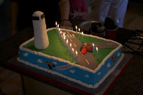 Airport cake - Sheet cake for 15 yr old son who loves to fly (simulators for now).  I loved the idea of this cake, but making an iPhone cake for his twin the same night + no time + ran out of fondant = bad looking air control tower.  Blah.  Tower made from rkt, covered in only one layer of fondant.  I wanted to wrap it in gray "brick" pattern (from fondant roller).  But that's that.  Rest is buttercream with fondant airstrip, plane. Airport Cake, Airplane Birthday Cakes, Iphone Cake, Cake Sheet, Planes Birthday Party, Fondant Roller, Tower Cake, Airplane Cake, Planes Birthday