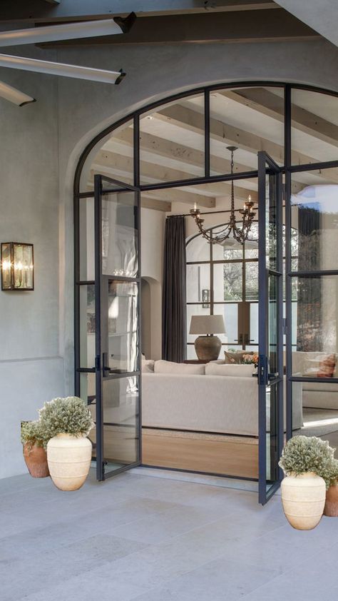 Window Above Front Door, Modern Spanish Farmhouse, French Doors Living Room, Arched French Doors, Window Walls, Modern Interior Door, Slider Door, Steel Windows, Arched Doors