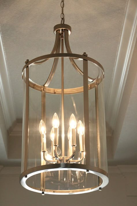 Light in Foyer Two Story Foyer Lighting, Entry Way Lighting Fixtures, Stair Landing Decor, Southern Charm Decor, Traditional Foyer, Entry Chandelier, Hallway Chandelier, Entryway Chandelier, Foyer Lighting Fixtures