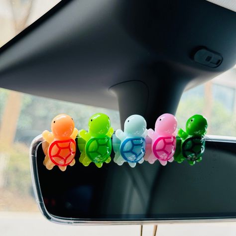 - A set of 5 cute cartoon turtle car ornaments, perfect for decorating your car. Made of high-quality resin, these ornaments are durable and long-lasting. They are also non-toxic and safe for children. #turtle #car #ornament #cartoon Dash Decor Car, Surfer Car Interior, Funny Car Accessories, Aesthetic Car Stuff, Car Inside Decorations, Cute Ways To Decorate Your Car, Cute Car Interior Ideas Decor, Indie Car Decor, Green Car Decor