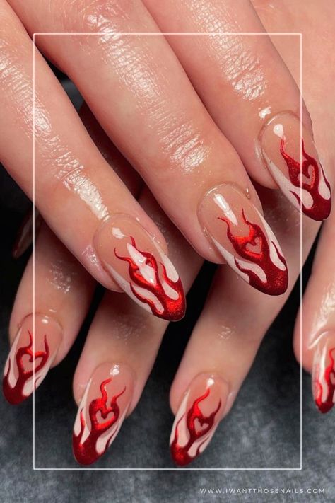 red chrome flaming heart nails Red Chrome Flame Nails, Flame Valentines Nails, Sparkly Flame Nails, Red Chrome Nails Designs Valentines, Flaming Heart Nails, Heart Flames Nails, Red Fire Nails Designs, Red Flame Nail Designs, Extra Valentines Nails