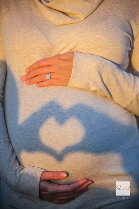 Maternity heart shadow Maternity Shoot Small Bump, Maternity Photography Valentines Day, Simple Cute Maternity Pictures, Maternity Couple Outfit Ideas, Maternity Photography Small Bump, Maternity Photography March, Nerdy Maternity Photography, Fall Bump Pictures, Single Mom Pregnancy Photos