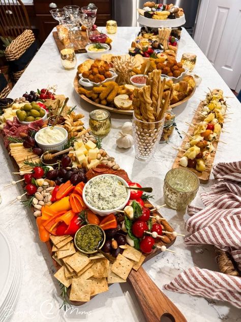 Impress your friends and family with these show-stopping charcuterie board hacks that will elevate your gatherings to new heights! From creative presentation ideas to unique flavor combinations, discover the secrets to crafting a crowd-pleasing feast that will have everyone talking long after the party ends. Goodbye Dinner Party, Charcuterie Board For 70 People, Big Party Charcuterie Board, Charcuterie Board For 80 People, Charcuterie For Large Group, Long Charcuterie Board Ideas, Cheese Board Large Party, Party Food Presentation Ideas, Charcuterie Board Party