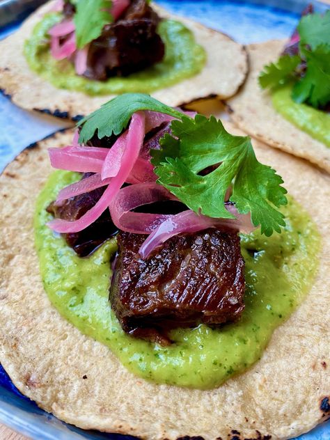 Braised Short Rib Tacos with Avocado Tomatillo Salsa Seafood Jambalaya, Short Rib Tacos, Avocado Tomatillo Salsa, Rib Tacos, Tacos With Avocado, Spicy Seafood, Salsa Ingredients, Tomatillo Salsa, Short Rib