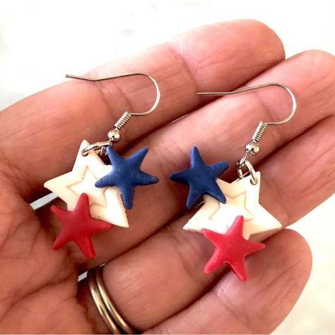 I Handcrafted These Star Earrings Out Of Polymer Clay And They Are Brand New And Fresh Out Of The Oven. Lightweight, Comfortable Dangle Earrings With Hooks. A White Embossed Star Is Surrounded By Smaller Red And Blue Stars For A Fun, Patriotic Motif. There Are Some Minor Imperfections That Add Character To The Handmade Design And Make Them Truly One Of A Kind. Great For 4th Of July Or Any Time. Would Be Great As A Gift Too. Handmade Blue Earrings For 4th Of July, Adjustable Blue Earrings For 4th Of July, Nickel Free Dangle Jewelry For 4th Of July, Patriotic Dangle Jewelry For Gifts, Patriotic Blue Dangle Jewelry, White Dangle Earrings For 4th Of July, 4th Of July Blue Drop Earrings, Patriotic Adjustable Dangle Jewelry, Blue Ear Wire Jewelry For 4th Of July