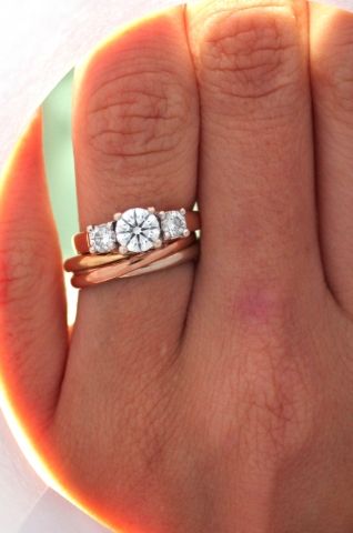 wedding band idea with cartier trinity ring Wedding Bands Cartier, Tri Stone Ring, Engagement Ring Stack, Cartier Trinity Ring, Rose Gold Moissanite Ring, Ring Stacks, Trilogy Engagement Ring, Diamond Jewelry Earrings, Trinity Ring