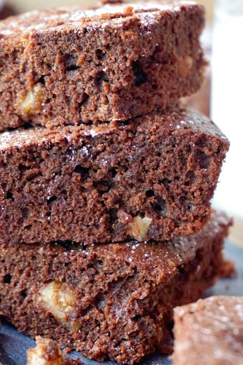 Cakey Walnut Brownies, a classic dessert that can be made at home from scratch in about 30 minutes. It has a light, chocolaty sponge with crunchy walnut pieces, so indulgent, hard to resist not having one too many brownies. Cut them in squares, or bake them as a cake, the result is the same scrumptious dessert. No need to buy the boxed kind, the homemade brownies are the real treat.#chocolatebrownies, #walnutbrownies, #chocolatedessert, #dessert Cakey Brownie Recipe, Brownie Recipe With Cocoa, Cakey Brownies, Cake Like Brownies, Classic Brownies Recipe, Cocoa Powder Recipes, Dessert From Scratch, Walnut Brownies, Best Chocolate Desserts