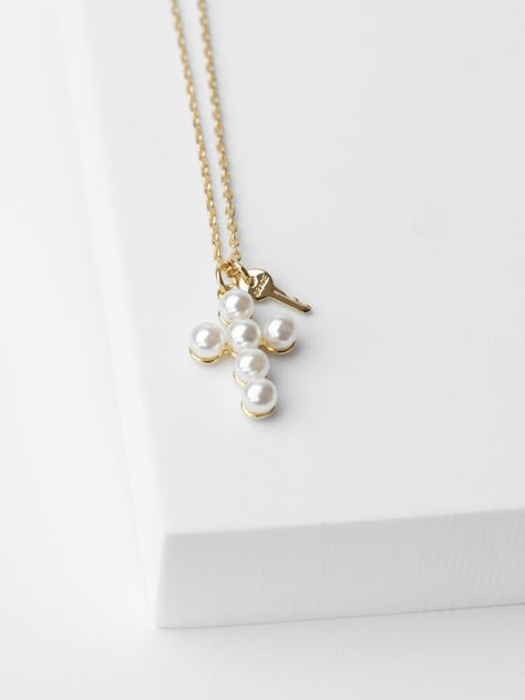 16" Dainty chain with 2" extender Lobster clasp closure Chain features a Pearl Cross and a mini key charm engraved with GRACE or HOPE Not available for customization Pearl Cross Necklace, Bday Stuff, Giving Keys, College Clothes, Key Jewelry, Exchange Student, Clothes Wishlist, Grad Pics, Dainty Chain