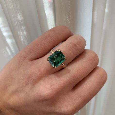 A gorgeous bespoke design created for a client with a 4.31 carat Green Emerald. What do you think about this chic ring? ✨ Emerald Green Engagement Ring, Green Engagement Ring, Emerald Ring Design, Green Engagement Rings, Future Engagement Rings, Green Ring, Green Rings, Dream Engagement Rings, Emerald Engagement