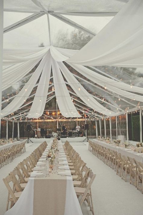 ###Maypole-Style Ceiling Draping Soften up a [clear-top reception tent](https://www.brides.com/gallery/wedding-tent-ideas) with overhead draping. This couple’s tent design features multiple white panels anchored in a spoke-and-wheel arrangement from the center of the tent. Smores Wedding, Bridal Themes, Wedding Reception Layout, Wedding Draping, Reception Layout, Clear Tent, Creative Table, Minimalist Wedding Decor, Brown Wedding