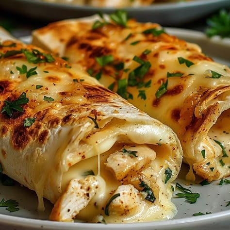 Cheesy Garlic Chicken Wraps Recipe Cheesy Garlic Wraps, Chicken Pouch Recipe, Chelsey Garlic Chicken Wraps, Cheesy Chicken Wraps Recipes, Grilled Chicken Roll Ups, Cheese Garlic Chicken Wraps, Chili Beef Garlic Butter Folded Wrap, Cheesy Chicken Roll Ups, Dinner Ideas Wraps