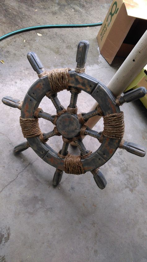 After finishing the steering wheel with rope.  Final result. How To Make A Pirate Ship Wheel, Pirate Ship Wheel Diy, Pirate Ship Wheel, Ships Steering Wheel, Pirate Ship Steering Wheel, Pirate Ship, Rafting, Steering Wheel, Under The Sea