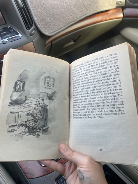 Reading Matilda loving books aesthetic in luxury car Matilda Aesthetic Harry Styles, Matilda Vibes, Matilda Aesthetic, Matilda Book, Musical Aesthetic, Miss Honey, Comfort Characters, In Car, Open Book