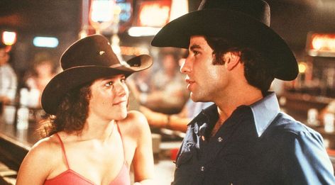 "Urban Cowboy" is often credited for kickstarting the pop-country movement that took place in the 1980s... Urban Cowboy Movie, Debra Winger, An Officer And A Gentleman, Johnny Lee, Charlie Daniels, Bonnie Raitt, Real Cowboys, Urban Cowboy, Fox Tv