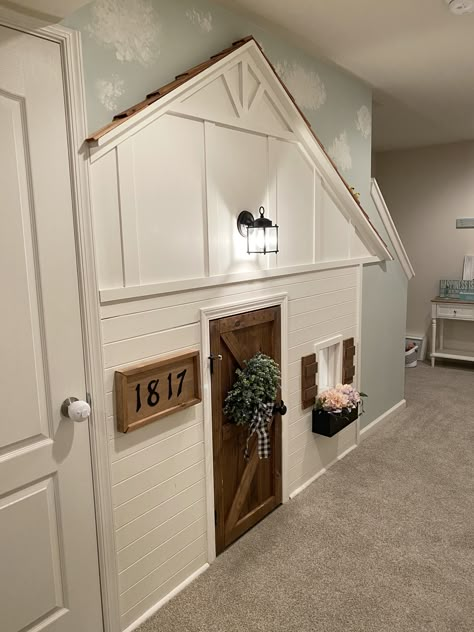 DIY under the stairs farmhouse playhouse #lowes #alabasterbysherwinwilliams #shiplap #boardandbatten Farmhouse Playhouse, Under Stairs Playhouse, Under Stairs Playroom, Under Stairs Dog House, Room Under Stairs, Minecraft Basement, Basement Playroom, Under The Stairs, Basement House