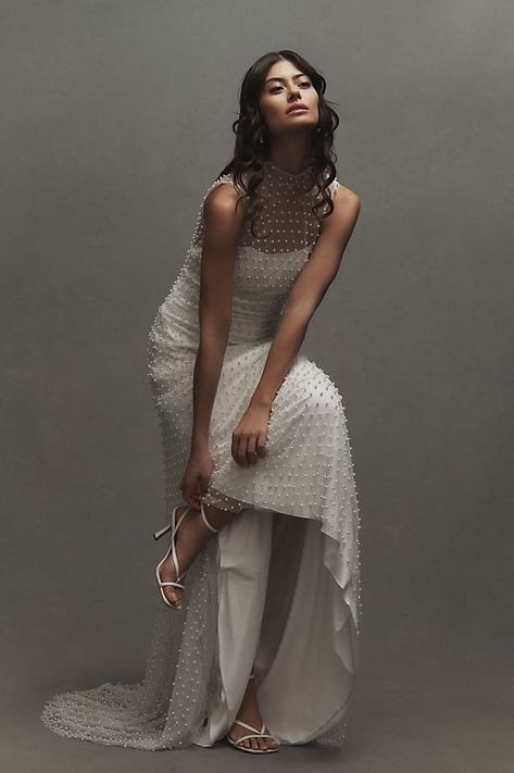 When it comes to pearls, the limit does not exist. This sheer mock-neck gown, dripping in pearls, is elegant, chic, and one-of-a-kind (just like your love). | Sloane Mock-Neck Pearl-Embellished Sheer Wedding Gown by Watters in White, Women's, Size: 4, Polyester at Anthropologie Boat Neck Sheath Wedding Dress, Pearl Lined Wedding Dress, Modern Winter Wedding Dress, Adding Pearls To Wedding Dress, Wedding Dresses To Elope In, Unique Timeless Wedding Dress, Embellished White Dress, Pearl Overlay Dress, Indian Inspired Wedding Dress