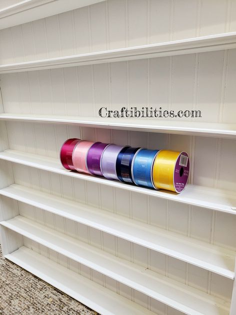 DIY ribbon storage shelf organizer - FINISHED! CRAFT ROOM wall holder/display/rack organization idea - How to make tutorial Ribbon Roll Storage Ideas, Ribbon Storage Wall Shelves, Ribbon Wall Storage, Diy Ribbon Organizer, Diy Ribbon Storage, Ribbon Storage Ideas, Ribbon Storage Ideas Diy, Craft Room Wall Storage, Diy Ribbon Holder