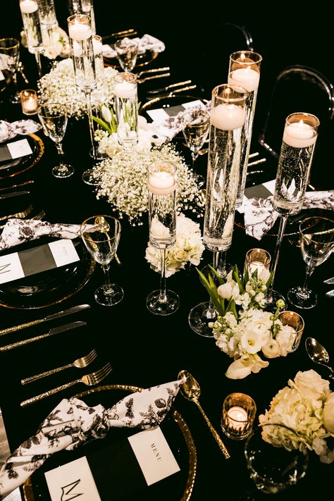 Black Gold Table Setting Wedding, Black On Black Table Setting Wedding, Black And Gold Venue Decorations, Black And Gold Nye Wedding, Wedding Table Decorations Black And Gold, Black White And Gold Wedding Reception Decor, Black Cream And Gold Wedding Decor, Black Gold And White Dinner Table, Black White And Gold Event Decor