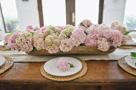 This post is different for me because it involves the color pink, but its main purpose is to document a tiny dream of mine. You see my favorite flower is the oh so beloved hydrangea. I love it for many reasons: 1. It speaks to me. 2. I find them very aesthetically pleasing. 3. My … Floral Dough Bowl Centerpiece, Dough Bowl Wedding Centerpiece, Hydrangea Dough Bowl Centerpiece, Hydrangeas Arrangements, Pink Farmhouse Decor, Summer Dining Table Decor, Fun Centerpieces, Pink Farmhouse, Vintage Tips