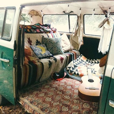 Furnished VW bus volkeswagen bus with geometric Aztec blankets acoustic guitar and bohemian Bohemia fashion style interior feuding Hippie Van Interior, Combi Hippie, Volkswagen Bus Interior, Old Van, Vans Vintage, Kombi Motorhome, Pillows And Blankets, Camper Travel, Bus Interior