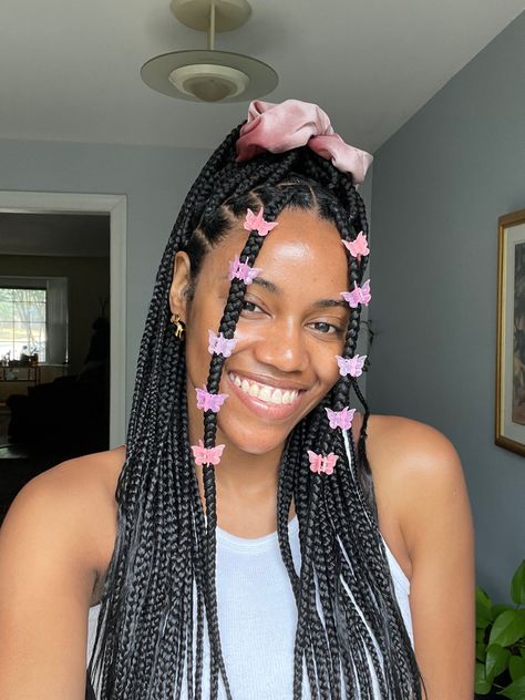 Small knotless braids updo hairstyle, medium long knotless braids Pink Butterfly Clips In Hair, Butterfly Clips Braids, Butterfly Clips With Braids, Butterfly Hair Clips Braids, Box Braids With Butterfly Clips, Butterfly Clips On Braids, Hair Clips On Braids, Braids Butterfly Clips, Braids With Butterfly Clips