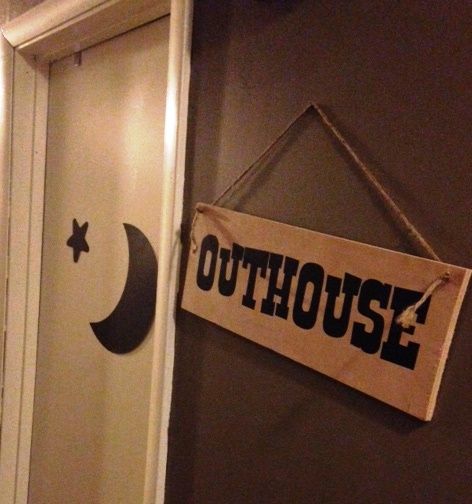 Used Silhouette machine and scrapbook paper (taped on) for the star and moon on "outhouse" door.  Used scrap luan under layment for the outhouse sign, with jute twine for the string.  The font is "Rustler". Outhouse Diy, Outhouse Signs, Outhouse Bathroom Decor, Outhouse Door, Outhouse Bathroom, White Trash Party, Western Signs, Bathroom Door Sign, Post Prom